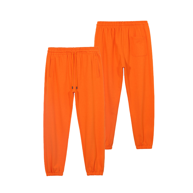 Front and back view of drawstring unisex orange sweatpants